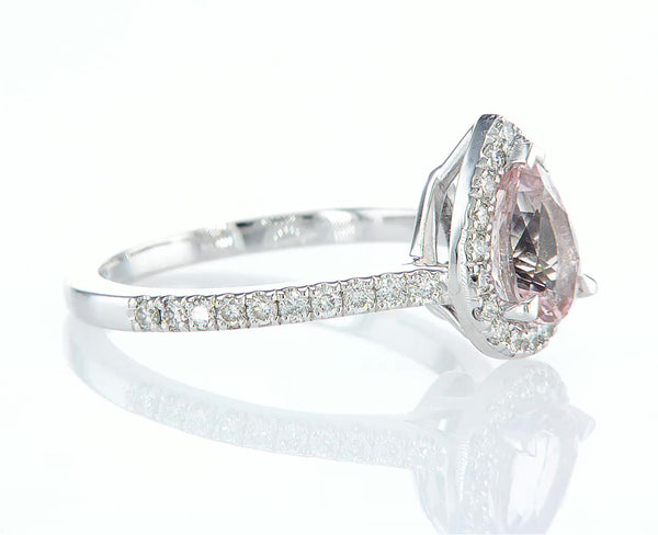 Pink pear morganite with diamond halo ring