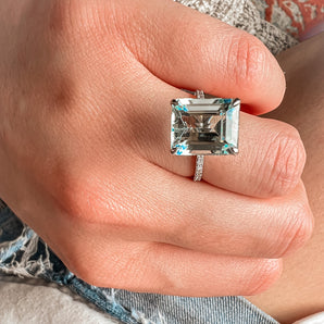 Emerald cut Blue Aquamarine with a Pavé Band